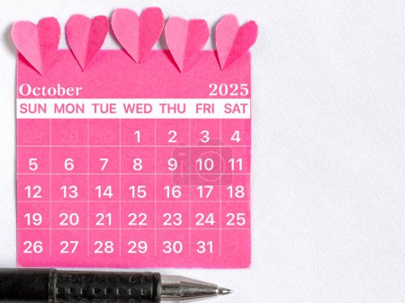 Photo for October 2025 calendar with pink color background. Women health concept. Stock photo. - Royalty Free Image