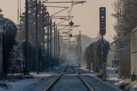 Photo for Road crossing on main electric railway near Budweis city in frosty cold morning - Royalty Free Image