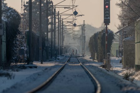 Photo for Road crossing on main electric railway near Budweis city in frosty cold morning - Royalty Free Image