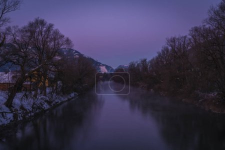 Foto de Color Enns river in sunrise frosty morning in Admont town in Austria - Imagen libre de derechos