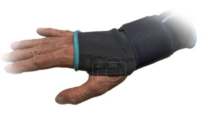 Foto de Red hand with blue new orthosis and light white background - Imagen libre de derechos