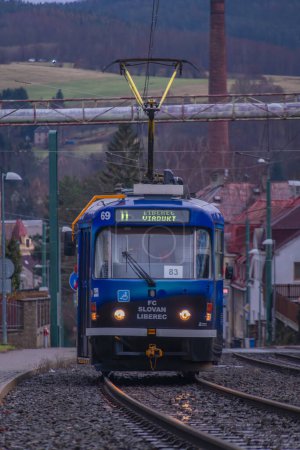 Photo for Trams in rainy wet slope in winter Vratislavice CZ 12 30 2023 - Royalty Free Image