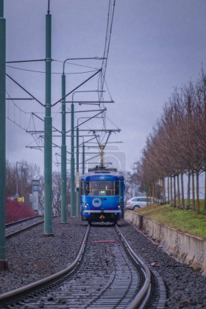 Photo for Trams in rainy wet slope in winter Vratislavice CZ 12 30 2023 - Royalty Free Image