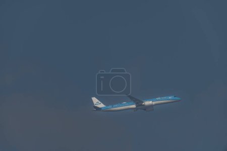 Photo for Airplanes with blue sky in spring sunny day in Schiphol airport Netherlands 03 06 2024 - Royalty Free Image