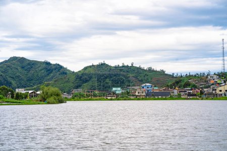 Photo for Telaga Cebong or Cebong lake view in Dieng Plateau early morning with blue sky. Landscape - Royalty Free Image
