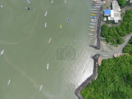Photo for Aerial view of waterfront city with boats in Suramadu, Surabaya, Indonesia. - Royalty Free Image