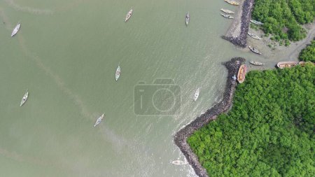 Photo for Aerial view of waterfront city with boats in Suramadu, Surabaya, Indonesia. - Royalty Free Image