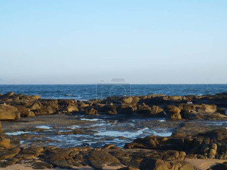 Photo for The rocky beach of Mooloolaba, Queensland, Sunshine Coast, Australia in the morning. - Royalty Free Image