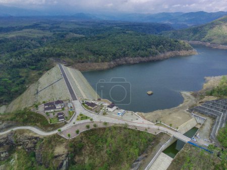 Photo for Aerial view of water dam against the hills and cloudy sky - Royalty Free Image