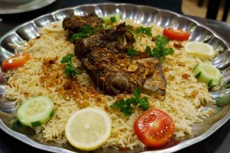 Photo for Top view of biryani rice served with lamb and vegetable in Ampel, Surabaya, Indonesia. Food Photography. - Royalty Free Image