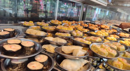 Photo for Assorted dimsums displayed for sale at the restaurant in Surabaya, Indonesia. Food Photohraphy - Royalty Free Image