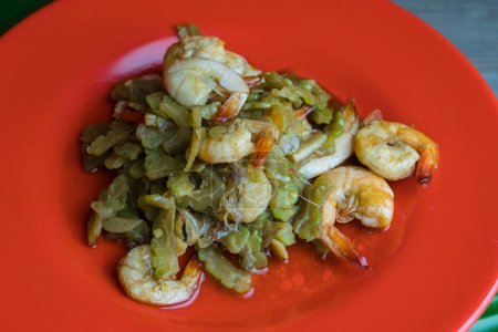 Photo for Indonesian spicy stir fried dish that combines bitter gourd with succulent shrimp. Food Photography - Royalty Free Image