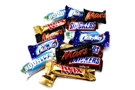 Photo for Rome, Italy  November 9, 2021: MARS, Twix, Bounty, Snickers and Milky way  chocolate bar isolated on white background. Mars is a brand of Mars Incorporated - Royalty Free Image
