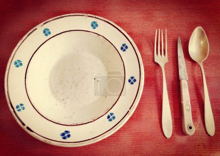 Photo for Original Antique Tableware: Dish Plate with nickel silver Fork, knife and Spoon - Royalty Free Image
