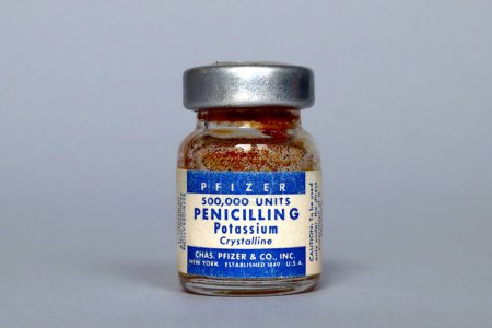 Photo for New York, USA  April 18, 2021: Vintage 1955 Vials of PFIZER Penicillin G - PFIZER is a US Pharmaceutical Companies Established in 1849 by Charles Pfizer and Charles Erhart - Royalty Free Image
