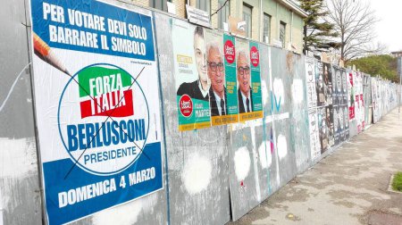 Photo for PESCARA, ITALY - March 01, 2018: Election Wall Posters for ITALY's ELECTION on MARCH 4, 2018 - Royalty Free Image