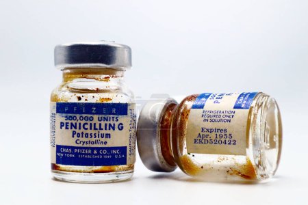 Photo for New York, USA  April 18, 2021: Vintage 1955 Vials of PFIZER Penicillin G - PFIZER is a US Pharmaceutical Companies Established in 1849 by Charles Pfizer and Charles Erhart - Royalty Free Image