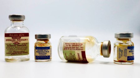 Photo for New York, USA  April 18, 2021: Vintage 1950s Vials of PENICILLIN G Produced in US by CSC Pharmaceuticals and Chas. PFIZER Co. New York - Royalty Free Image