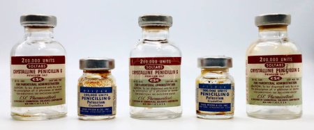 Photo for New York, USA  April 18, 2021: Vintage 1950s Vials of PENICILLIN G Produced in US by CSC Pharmaceuticals and Chas. PFIZER Co. New York - Royalty Free Image