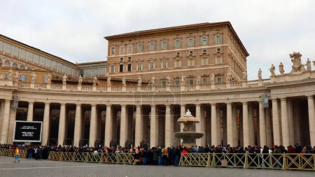 Photo for Vatican City, Holy See  January 2, 2023: Queue of people waiting to enter at St. Peter's Basilica to see the body of the late Pope Emeritus Benedict XVI to say their final farewell - Royalty Free Image