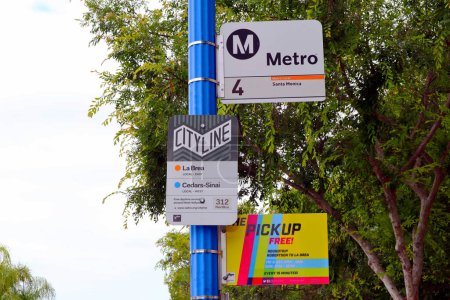 Photo for West Hollywood, California, USA - May 30, 2023: CITYLINE, LA METRO and THE PICKUP Bus Stop sign on Santa Monica Blvd, West Hollywood - Royalty Free Image