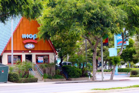 Photo for West Hollywood, California, USA - May 30, 2023: IHOP (International House of Pancakes) restaurant. IHOP offering a Variety of Breakfast, Lunch and Dinner Meals - Royalty Free Image