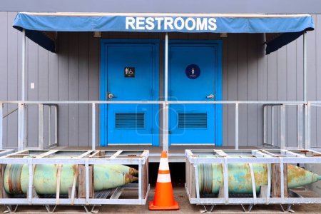 Photo for Public Restrooms for Men and Women near bomb depot - Royalty Free Image