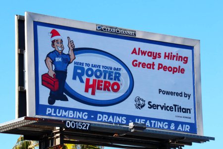 Foto de Los Angeles, California  December 5, 2023: Rooter Hero Plumbing Billboard Campaign - Imagen libre de derechos