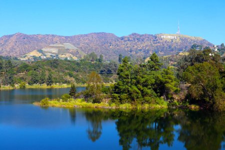 Photo for Hollywood, Los Angeles, California - November 2, 2023: view of HOLLYWOOD Reservoir and Hollywood sign perched atop Mount Lee - Royalty Free Image