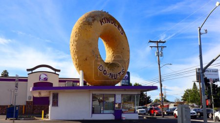 Photo for Los Angeles, California - November 22, 2023: Kindle's Donuts with a giant doughnut on the roof located at 10003 Normandie Ave, Los Angeles - Royalty Free Image