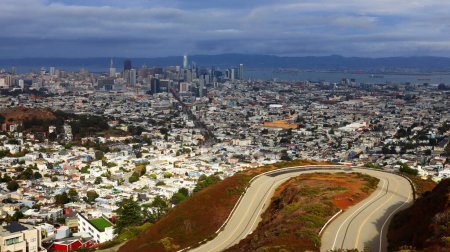 Photo for San Francisco, California - October 25, 2023: skyline from Twin Peaks and curved road Twin Peaks Blvd - Royalty Free Image