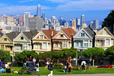 Photo for San Francisco, California - October 23, 2023: The Painted Ladies, Victorian houses at 710720 Steiner Street across from Alamo Square park - Royalty Free Image