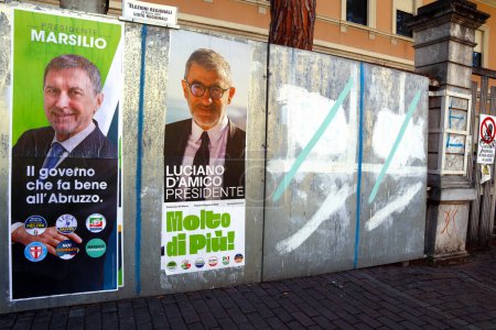 Photo for Abruzzo, Italy - March 3, 2024: Election Wall Posters for the ABRUZZO Regional ELECTIONS of March 10, 2024. Candidates and symbols of Political Parties - Royalty Free Image