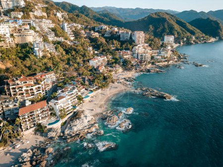 Photo for Close-up aerial view of Conchas Chinas Beach and it nearby hotels in Puerto Vallarta Mexico. - Royalty Free Image