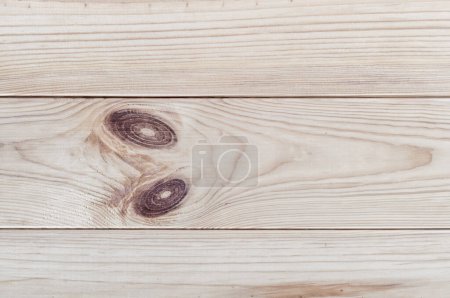 Experience the natural beauty of pine wood with this high-resolution texture image. Admire the intricate grain patterns and texture of the pine wood planks, perfect for adding warmth and character to your design projects.