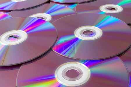 Photo for Immerse yourself in the mesmerizing display of rainbow reflections dancing across a collection of compact discs. A stunning representation of modern innovation and creativity. - Royalty Free Image
