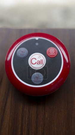 Photo for Wireless restaurant pager caregiver pager wireless nurse call system. Button transmitter calling system. - Royalty Free Image