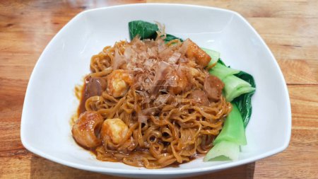 Gourmet Truffle Oil Seafood Fried Noodles on Elegant White Plate