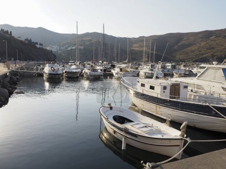 Small port between mountains with Latin boats