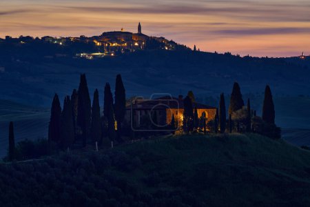 Photo for Pienza town in night, landscape in Tuscany, near the Siana and Pienza, Sunrise morning in Italy. Idyllic view on hilly meadow in Tuscany in beautiful morning light, Italy. Foggy morning in nature. - Royalty Free Image