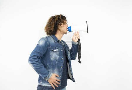 Photo for Middle eastern man in shouting through megaphone - Royalty Free Image