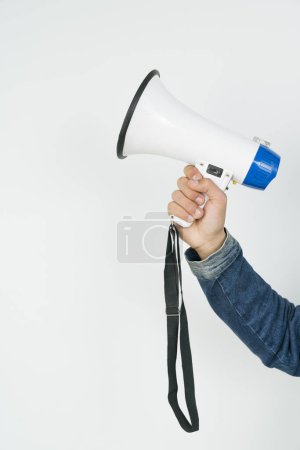 Photo for Cropped Hand Of Man Holding Megaphone - Royalty Free Image