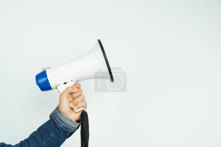 Photo for Cropped Hand Of Man Holding Megaphone - Royalty Free Image
