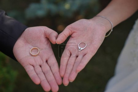 Photo for Bride and groom showing wedding rings - Royalty Free Image