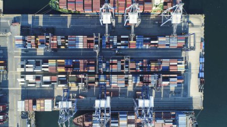 Photo for Container ship docked in port as seen from above - Royalty Free Image