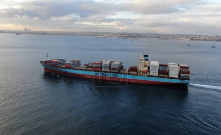 Photo for Istanbul, Turkey  Jan 19, 2021: Aerial view of freight ship with cargo containers. - Royalty Free Image
