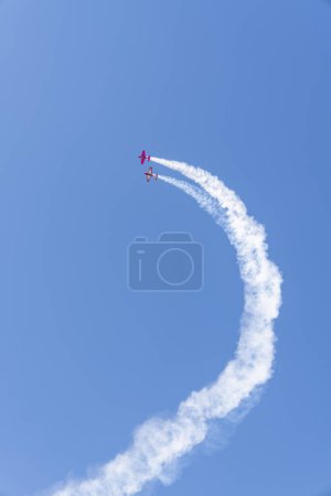 Photo for Aircrafts performing aerobatics at airshow - Royalty Free Image