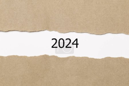 Photo for 2024 year inside of brown torn paper - Royalty Free Image