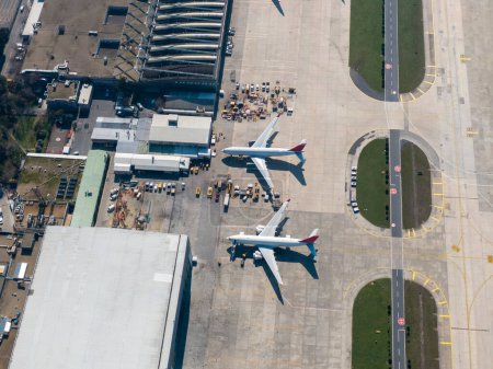 Photo for Aerial view of airport terminal with parked airplanes - Royalty Free Image