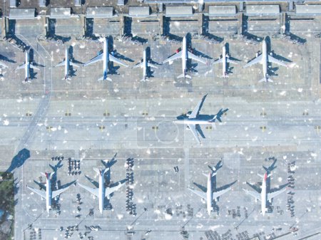 Photo for Aerial view of airport terminal with parked airplanes - Royalty Free Image